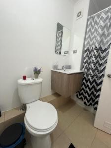 Et badeværelse på bulnes urbano suites 1