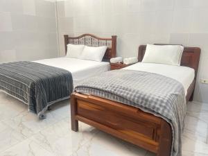 Ένα ή περισσότερα κρεβάτια σε δωμάτιο στο Residencial NUBE 69