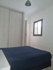 Ένα ή περισσότερα κρεβάτια σε δωμάτιο στο San José