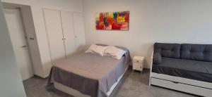 Ένα ή περισσότερα κρεβάτια σε δωμάτιο στο 16 luxury