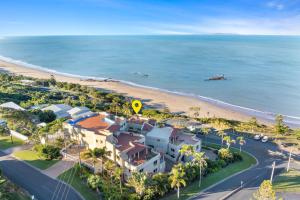 an aerial view of a beach with houses and a road at 'Villa Mar Colina U12' Coastal Escape, Yeppoon in Yeppoon