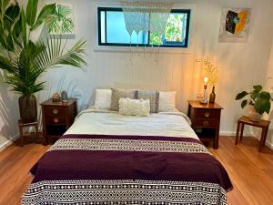 Кровать или кровати в номере Byron Bay Hinterland Sanctuary