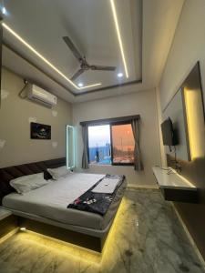 Ένα ή περισσότερα κρεβάτια σε δωμάτιο στο Sharayuu Villa +27 φωτογραφίες