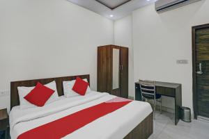 Postel nebo postele na pokoji v ubytování Hotel O Prince