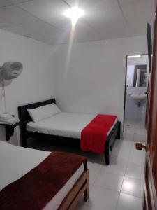 Ένα ή περισσότερα κρεβάτια σε δωμάτιο στο Hotel Galerias