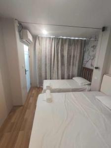 Postel nebo postele na pokoji v ubytování Priscilla Apartment家庭公寓两居室 步行到麦当劳 近超市餐厅 免费停车位