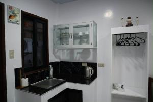 Η κουζίνα ή μικρή κουζίνα στο Jmt Star's Inn