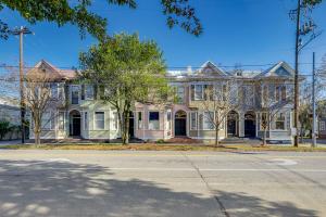 a large house on the corner of a street at Nesting Escapes at Abercorn in Savannah
