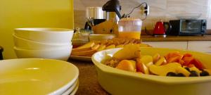 a table with a bowl of food on a counter at Casa Rumi - Guesthouse in La Paz