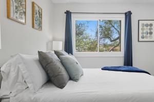 En eller flere senge i et værelse på The Family Haven