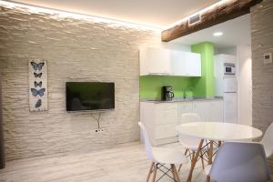 Kuchyň nebo kuchyňský kout v ubytování Maddiola Apartment