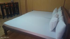 Ένα ή περισσότερα κρεβάτια σε δωμάτιο στο Kiyomi's Inn