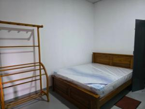 En eller flere senge i et værelse på Leisure Sunshine