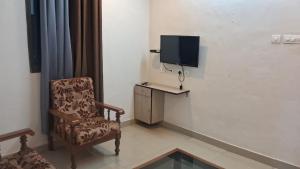 TV a/nebo společenská místnost v ubytování Hill palace Inn