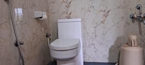 Koupelna v ubytování Hill palace Inn