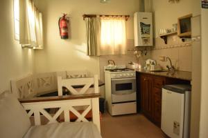 Køkken eller tekøkken på Cabañas del Mirador