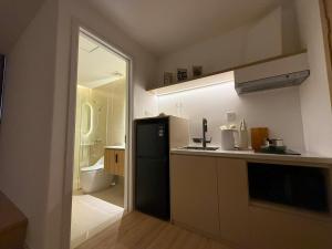 Kuchyň nebo kuchyňský kout v ubytování Reka Home + 46 fotografií