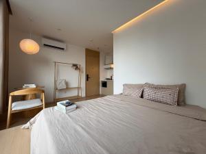 Postel nebo postele na pokoji v ubytování Reka Home