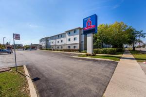 a building with a walmart sign on the side of a road at Studio 6 Toronto - Mississauga with Kitchenettes in Mississauga