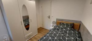 Ένα ή περισσότερα κρεβάτια σε δωμάτιο στο Ferienwohnung Monteurs Wohnung am Teutoburger Wald +6 φωτογραφίες