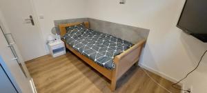 Ένα ή περισσότερα κρεβάτια σε δωμάτιο στο Ferienwohnung Monteurs Wohnung am Teutoburger Wald