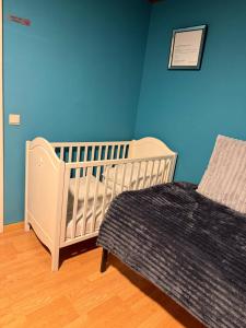 Postel nebo postele na pokoji v ubytování La Ferme des Roses