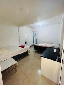 Postel nebo postele na pokoji v ubytování Hotel Julián Cotuc