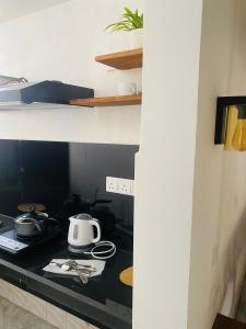 Η κουζίνα ή μικρή κουζίνα στο The Breeze Mirissa