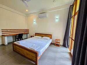 Ένα ή περισσότερα κρεβάτια σε δωμάτιο στο HIRI Fortress