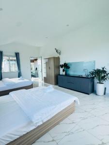 Ένα ή περισσότερα κρεβάτια σε δωμάτιο στο Sunrise Guest House +17 φωτογραφίες