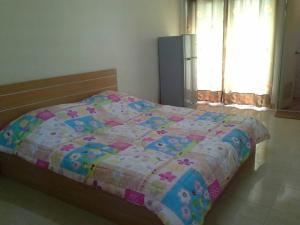 Postel nebo postele na pokoji v ubytování The Prince Residence , Chiang Rai