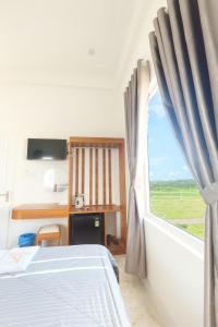 Ένα ή περισσότερα κρεβάτια σε δωμάτιο στο K Hotel Phú Quý +32 φωτογραφίες