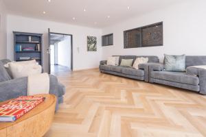 Χώρος καθιστικού στο Villa Noor Modern 2 Bed Luxury Retreat