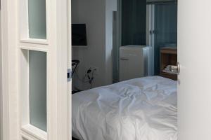 Postel nebo postele na pokoji v ubytování 스테이머물다 event suite