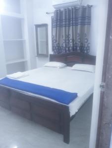 Ένα ή περισσότερα κρεβάτια σε δωμάτιο στο Glamour palace