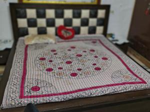 Un pat sau paturi într-o cameră la Stay home villas