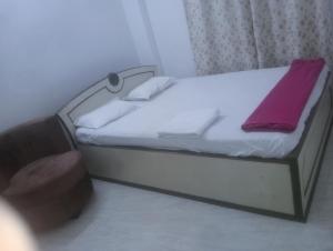 Ένα ή περισσότερα κρεβάτια σε δωμάτιο στο Glamour palace