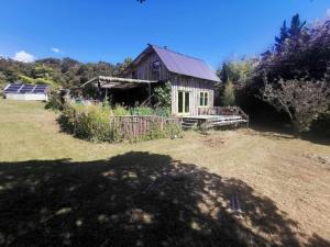 Zahrada ubytování Katikara Eco-Community - Rosewood accommodations