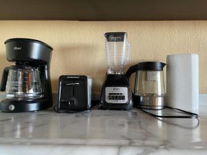 Příslušenství pro přípravu čaje a kávy v ubytování Casa Luca