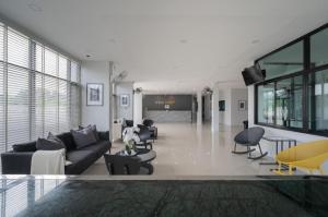 Posezení v ubytování C2U Hotel Uthai Thani