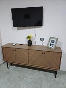 TV a/nebo společenská místnost v ubytování Casa Las Camelias