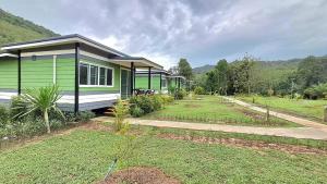 Zahrada ubytování Greenview Room and Restaurant + 6 fotografií