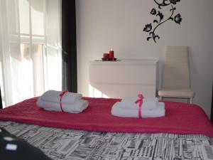 Posteľ alebo postele v izbe v ubytovaní Apartamenty Szczęśliwe Sny