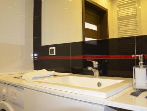 Kúpeľňa v ubytovaní Apartamenty Szczęśliwe Sny