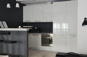 Kuchyňa alebo kuchynka v ubytovaní Apartamenty Szczęśliwe Sny
