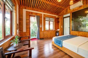 Кровать или кровати в номере Hang Mua Green Garden Homestay +83 фотографии