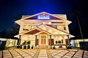 a building with an amazon sign on the front at amaze Beach Resort in Varkala
