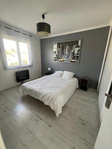 En eller flere senge i et værelse på Grande maison zen + 33 billeder