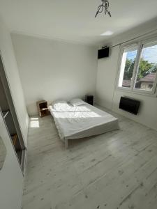 En eller flere senge i et værelse på Grande maison zen