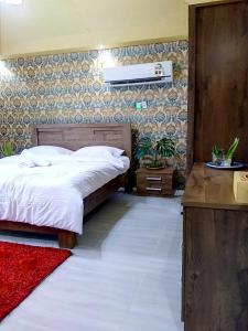 Кровать или кровати в номере Andalusia Farm Resort Whole Farm